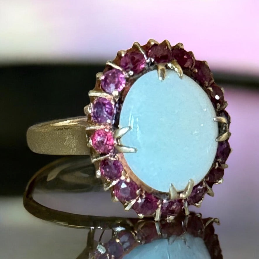 Oval Opal and Ruby Halo Ring