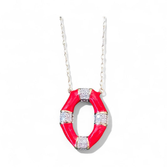 Red enamel, diamond, and gold pendant