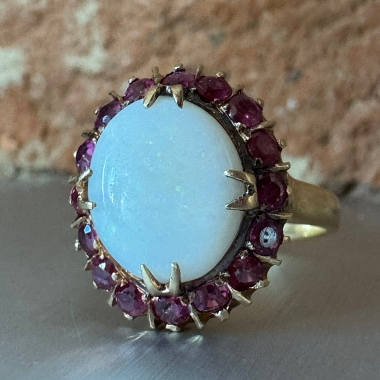 Oval Opal and Ruby Halo Ring