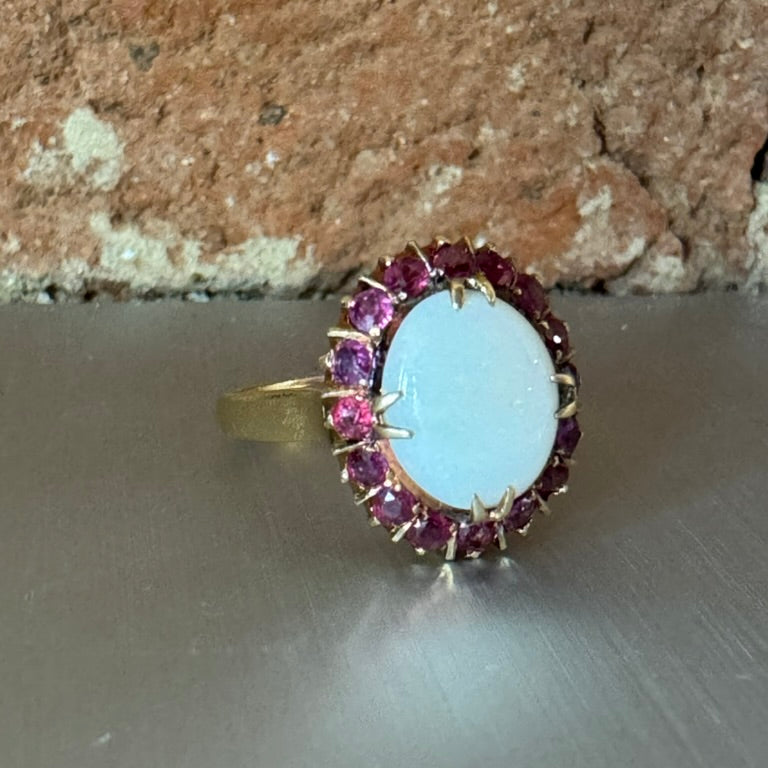 Oval Opal and Ruby Halo Ring