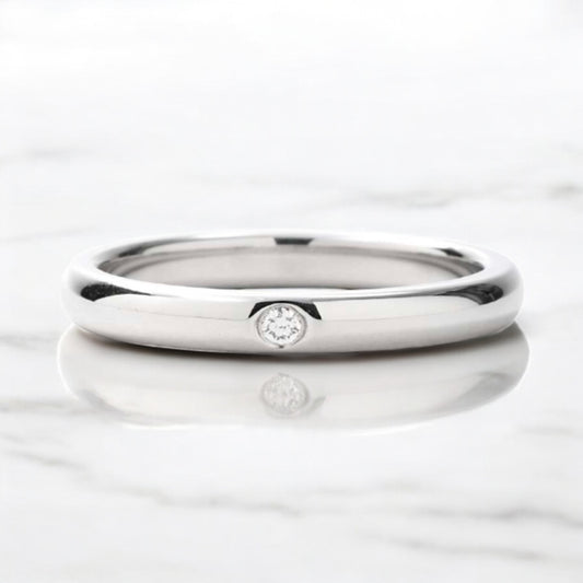 Contemporary Platinum Ring with Diamond